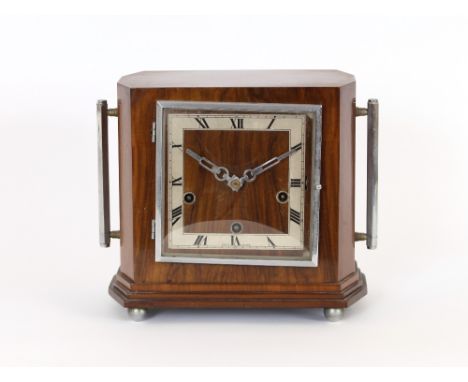 An Art Deco walnut cased and chrome mounted mantel clock, having chiming movement, 24cm high, 24cm wide