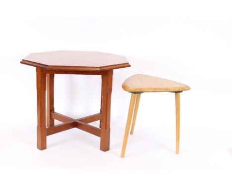 A 20th Century mahogany octagonal low occasional table; and an Ercol style triform coffee table (2)