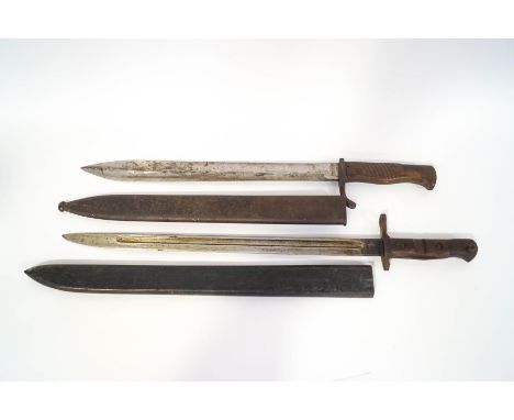 A WWI German bayonet, stamped P.D. Luneschloss Solingen, and an American Remington Chassepot bayonet, with later scabbard
