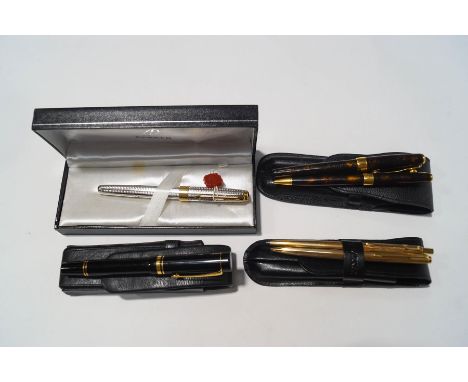 A collection of Parker pens, comprising a Sonnet fountain pen with 18K nib, cased, a Sonnet fountain pen and roller ball set,