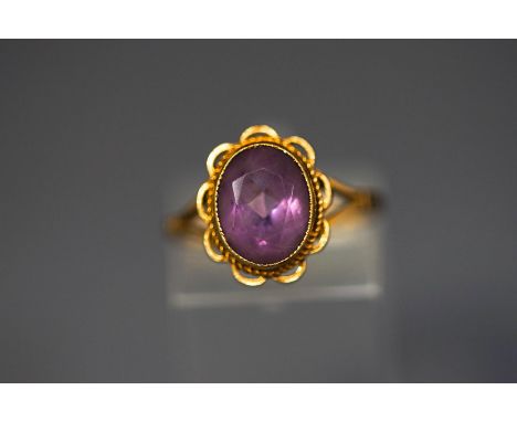 An amethyst single stone ring, stamped '9ct', finger size M, 2.8 g gross