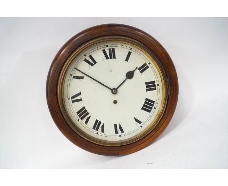 A mahogany cased dial clock, together with the key and pendulum, 41cm diameter