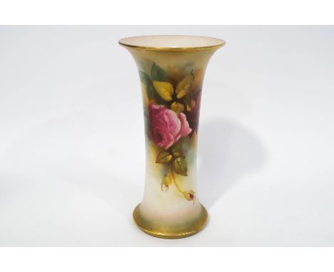 A Royal Worcester vase of flared cylindrical form, painted with roses and gilt decoration, signed M Hunt, printed marks to ba