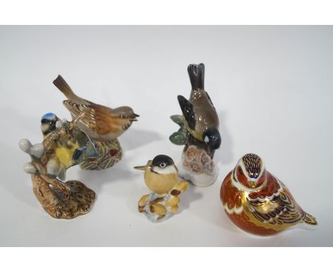 A Royal Crown Derby bird paperweight, a  Rosenthal figure of a bird, a Royal Worcester Sparrow and a Marsh Tit, and a Goebel 