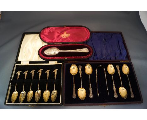 A late Victorian silver christening spoon, by G.M.Jackson, London 1894, cased; with a cased set of six silver tea spoons with