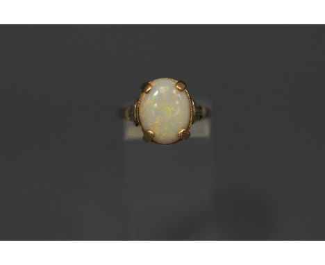 A single stone opal ring, stamped '9ct GOLD' finger size Q, 4.4 g gross