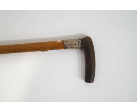 A horn handled walking stick with silver collar, inscribed 'presented to PC Read by the Borough of Bridgwater Police 1903'