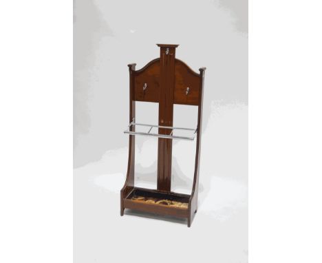 A mahogany hall stand with three chrome hooks above a chrome framed three division stick stand, 131cm high x 57cm wide x 28cm