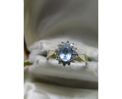 14ct YELLOW GOLD AQUAMARINE &amp; DIAMOND RING, central oval cut aquamarine surrounded by accent brilliant cut diamonds and h