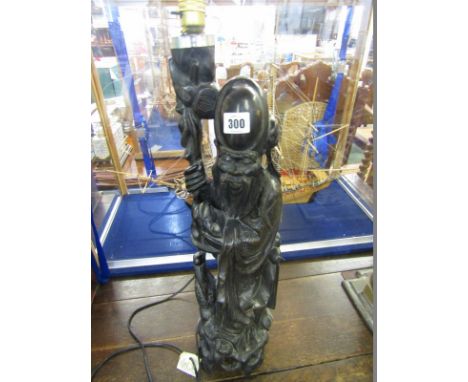 ORIENTAL CARVING, a carved cherryroot  sage table lamp base, 23" Height 