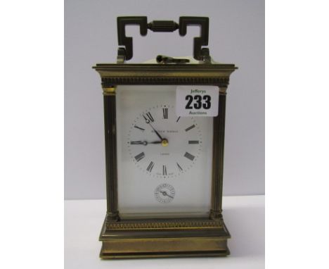 CARRIAGE CLOCK, a repeater brass cased carriage clock by Matthew Norman, coiled bar strike with fluted brass column design an
