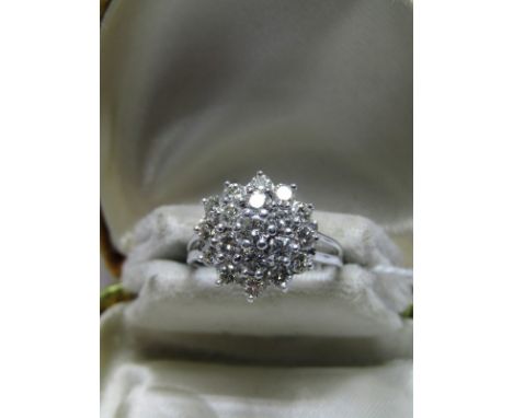 18ct WHITE GOLD DIAMOND CLUSTER RING; Unusual design, split 'V' shank leading to diamond cluster totalling approx 1 ct of wel