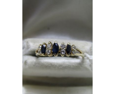 9ct YELLOW GOLD SAPPHIRE &amp; DIAMOND ETERNITY STYLE RING, 3 marquise cut sapphires seperated by 4 pairs of small brilliant 