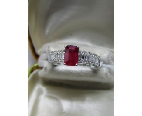 14CT WHITE GOLD RUBY &amp; DIAMOND RING; Rectangular cut Ruby in excess of 1ct, set with channel set mixed Princess baguette 