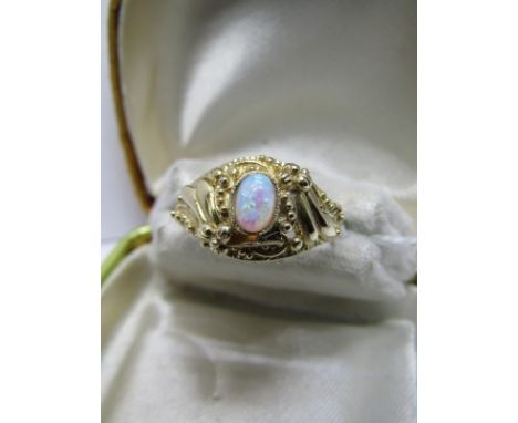 9CT YELLOW GOLD OPAL RING; Oval opal in fancy Rococo style setting, size 'N/O' 