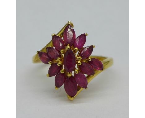 A silver gilt ruby cluster ring, size S