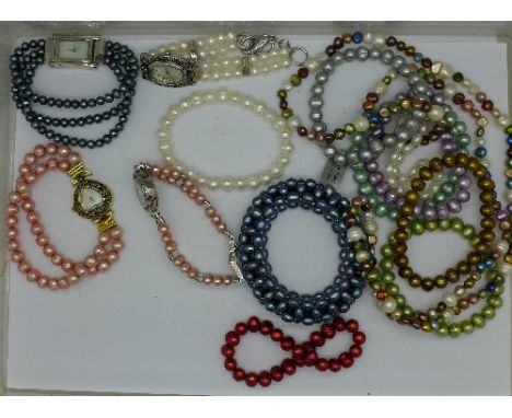 Nine cultured pearl necklaces and four cultured pearl wristwatches
