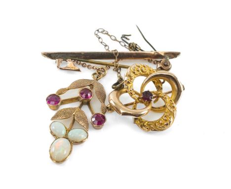 RUBY &amp; OPAL LEAF BROOCH, unmarked yellow metal leaf frame suspended from 9ct gold foliate engraved bar, 5cms drop, 3.9g; 