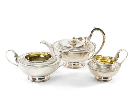 GEORGE III SILVER THREE PIECE TEASET, William Burwash & Richard Sibley, London 1809, comprising teapot, sucrier and cream jug