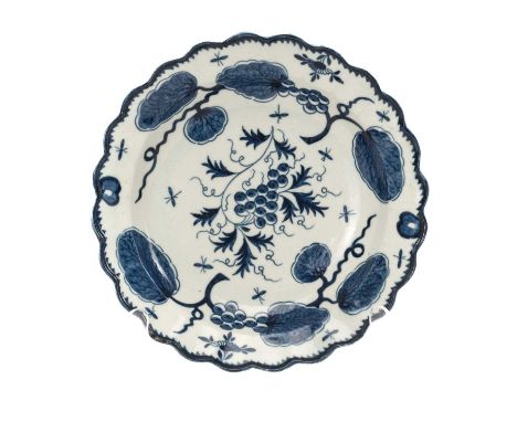 RARE FIRST PERIOD WORCESTER DISH painted in the 'rubber tree plant' pattern, pseudo Chinese script mark, c.1775, 19cms diamet