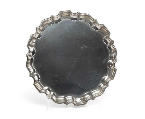 VICTORIAN SILVER SALVER, Thomas Bradbury & Sons, London 1893, piecrust form on three scrolled legs, 25.5cms diam. 19oztProven
