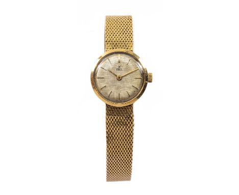18CT GOLD EBEL LADIES' WRISTWATCH, the circular dial with baton hour markers, with integrated brick link 18ct gold bracelet, 