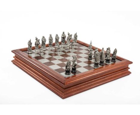 DANBURY MINT CAMELOT CHESS SET, antiqued pewter pieces, original wooden boxProvenance: private collection South WalesComments