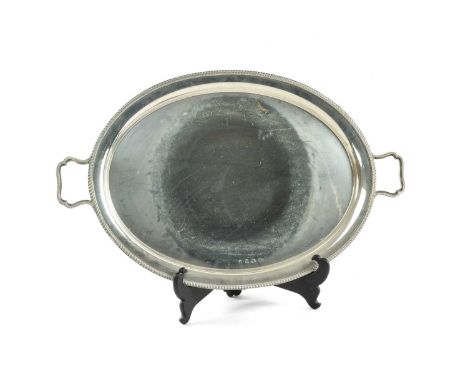 ELIZABETH II LARGE OVAL SILVER TRAY, twin handles, Chester 1962, 90 ozt approx.Provenance: private collection GwyneddComments