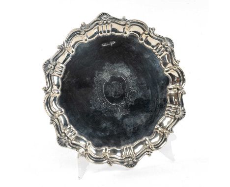 SOLID SILVER SALVER, acanthus leaf and shell border, raised on three feet, engraved cartouche with initials, 21cms diameter, 