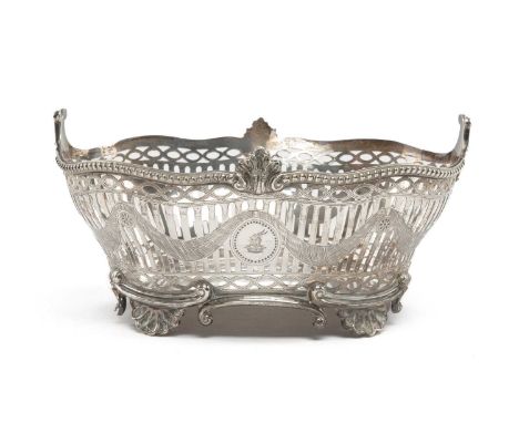 VICTORIAN SILVER CRESTED BASKET, Charles Stuart Harris, London 1899, oval form with pierced sides, engraved drapery and engra