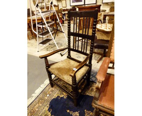 Bobbin turned oak rush seated large 19thC armchair 