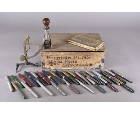 A collection of shop stock fountain pens, with gold nibs by Burnham, Stephens, Mentmore and others together with a shop date 