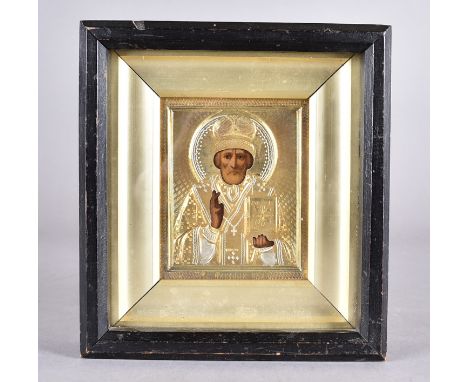 A Russian silver gilt icon, the glazed picture with silver gilt engine turned cover, with portrait of a saint 21 cm x 20 cm 