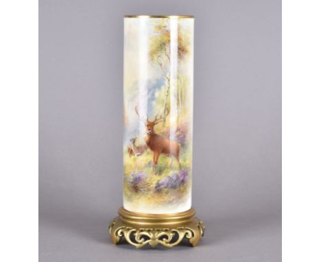 A Royal Worcester sleeve vase, with painted stag and doe decoration in highland landscape, signed H Stinton, puce mark to bas