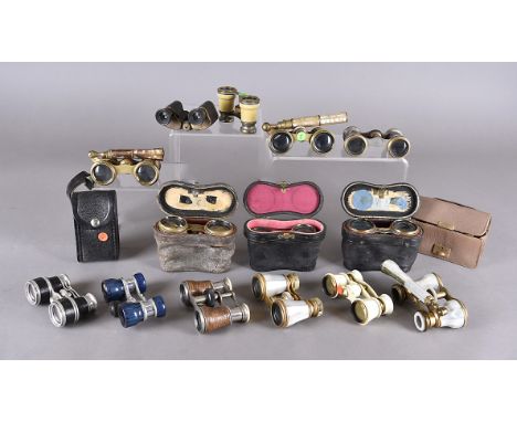 A collection of opera glasses, including some field examples, some in mother of pearl, others in leather, some cased, a quant