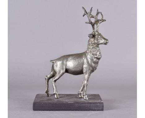 A modern cast study of standing stag on rectangular plinth, 34 cm high