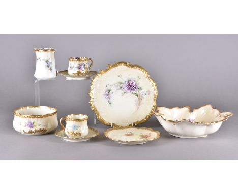 An extensive continental Nautilus tea service with painted floral sprays heightened in gilt, marked to base Nautilus Porcelai