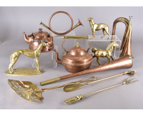 A 19th Century copper coaching horn, in two parts, total length 115 cm together with copper kettle, miniature brass and coppe