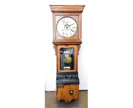 A large wall mounted oak International Time Recording clock in architectural case, 133 cm high x 45 cm wide x 28 cm max deepS