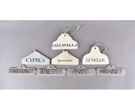 Four 19th Century ceramic cellar labels, marked Calcavella, Lunelle, Frontignac and Cyprus together with four metal examples 