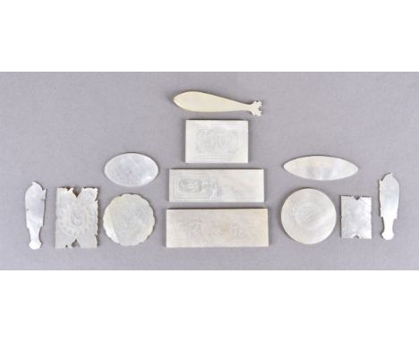 A small collection of Chinese mother-of-pearl gaming counters