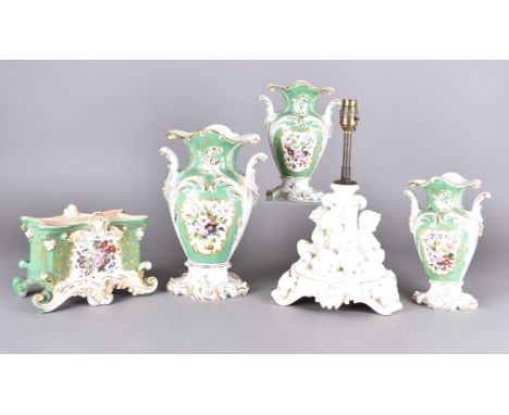 A 19th century French porcelain garniture, ovoid vases with central floral sprays, green and white ground heightened in gilt,