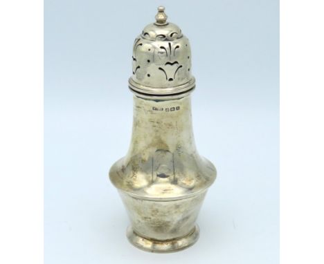 A 1934 Birmingham silver sugar sifter by William Haseler, 160mm tall, 117.5g