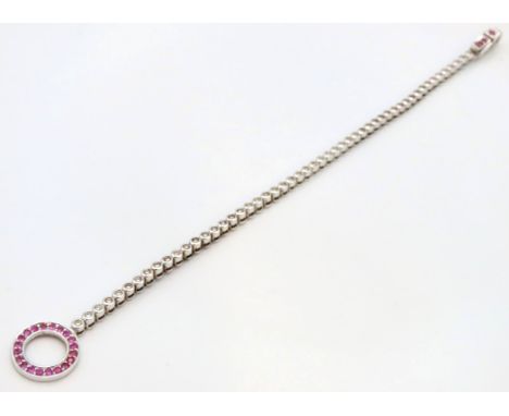 A Cartier style 18ct white gold bracelet set with ruby & diamond of approx. 1.04ct, 180mm long, 13.2g