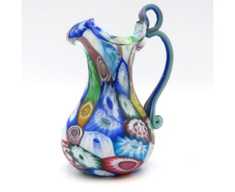 A c.1910 Fratelli Toso style Murano glass millefiori jug, 100mm tall