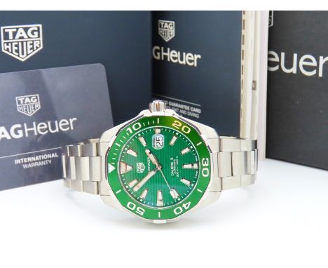 An as new, unworn gents TAG Heuer Aquaracer Calibre 5 green dial automatic wristwatch, case diameter 44.5mm, with booklet, bo