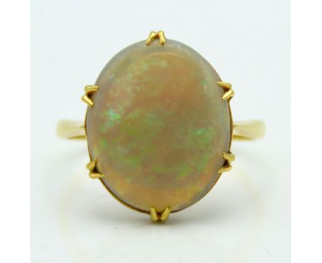 An 18ct gold ring set with opal, stone 17mm x 13mm, 3.2g, size P