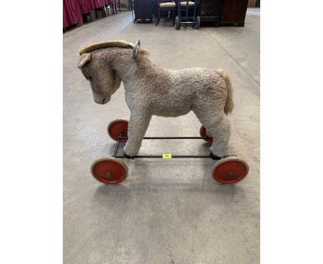 A Steiff push-along horse. Button in ear. 22' high. c.1950s