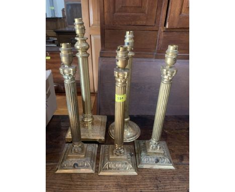 Five brass lamp bases
