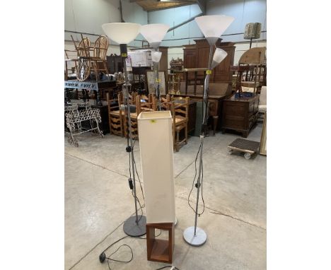 Three uplighter lamps and a floor lamp. (4)